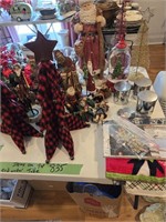 Christmas Items On Top Of Table And Boxes Under
