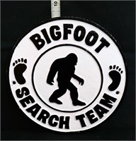 Round cast iron Bigfoot Search Team sign