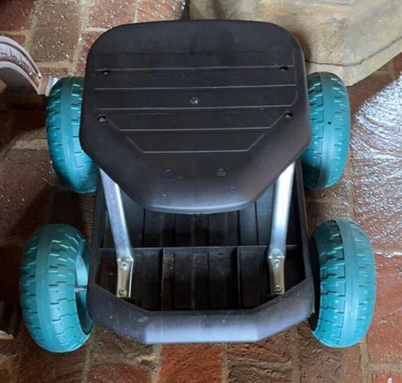 Plastic gardening stool on wheels