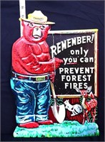 Metal embossed Smokey Bear sign