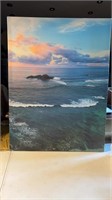 A pair of ocean scene canvas pictures
