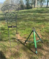 Tripod sprinkler and water spigot with hose reel