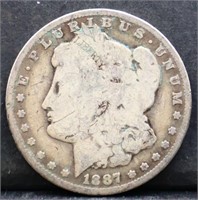 1887O Morgan silver dollar