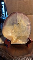 Signed hand carved shell art