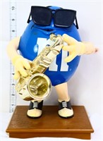 Blue battery op M&M figure w/ saxophone
