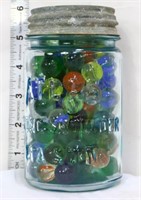 Vintage blue fruit jar w/ marbles inside