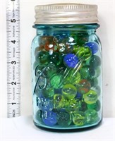 Vintage blue fruit jar w/ marbles inside