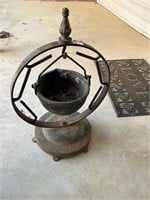 Cast plant  holder with metal stand