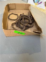 Box of horse shoes