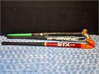 3 field hockey sticks