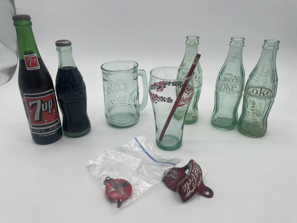 Assorted Coke bottles, can opener