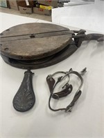 Vintage pulley ; powder flask; stirrups