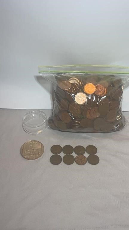 COMMEMORATIVE COIN AND PENNIES