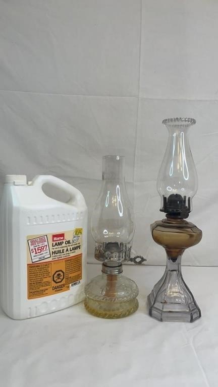 TWO VINTAGE GLASS OIL LAMPS