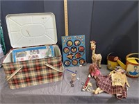 Vintage metal picnic basket with vintage toys