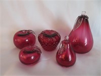 A Collection of Fruit Form Cranberry Glass
