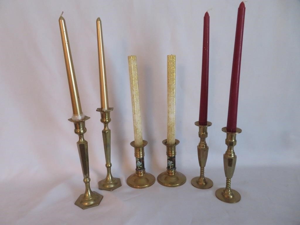 A Collection of Brass Candlesticks