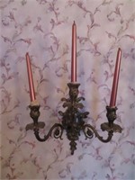 A Pair of Antiqued Spelter Three Arm Sconces