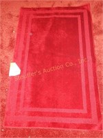 2'6" x 3'10" red rug
