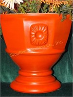 Orange planter w/flowers