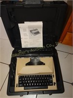 Sears portable typewriter with plastic case