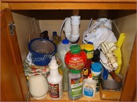 Contents under Island sink, cleaners, misc