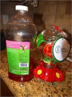 Hummingbird feeder NWT, w/partial bottle of food