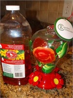 Hummingbird feeder NWT, w/partial bottle of food