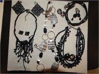 4 sets  necklaces and clip on earrings