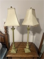 Two tall lamps. Please note one has burnt cord.