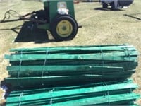 Roll green wooden snow fence