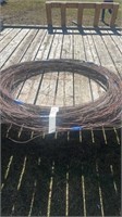 Rolls of electric fence wire