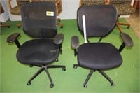 2 black office chairs