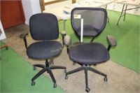2 black office chairs - shows wear