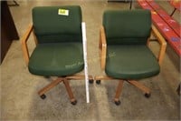 2 green office chairs