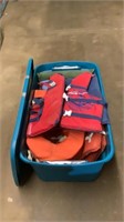 Tote with lid and life vests