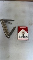 Pocket knife and mini Marlboro box of matches