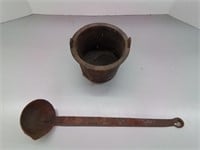 Vintage smelting pot with ladel