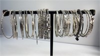 Silver toned bangles, 2 sets and 4 rhinestones