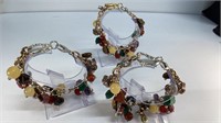 3 link bracelets with enamel charms and beads,