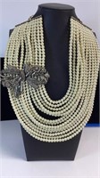 Heidi Daus designer pearl strands with rhinestone