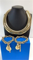 Gold Omega necklace and 2 tassel bracelets,