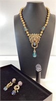 Heidi Daus lion pendant necklace, blue rhinestone