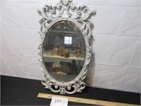 Grey round mirror