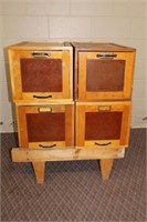 Four wood filing drawers on handcrafted stand,