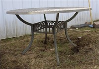 Cast /metal patio table with lazy susan 47 X 27"H