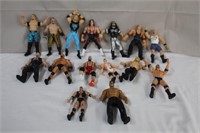 Fifteen wrestler figures