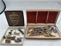 Assorted tie clasps bars and cufflink
