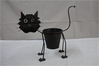 Metal planter, 13 X 12"H, missing eyes