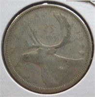 Silver 1957 Canadian quarter